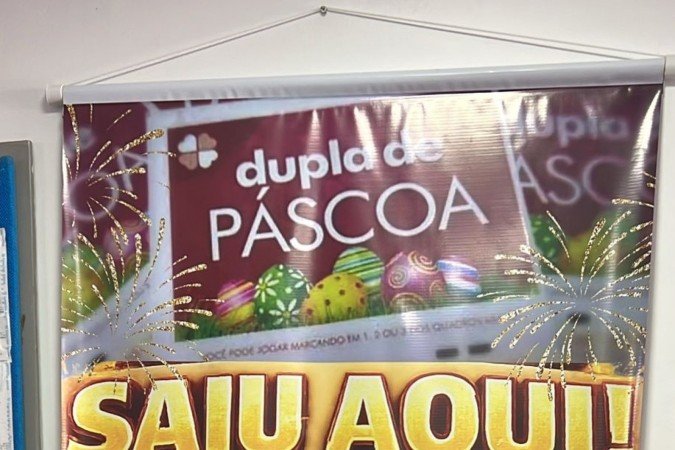 Banner na lotérica Nossa Senhora Aparecida, no Guará II, onde foi feito o bilhete vencedor da Dupla Sena de Páscoa