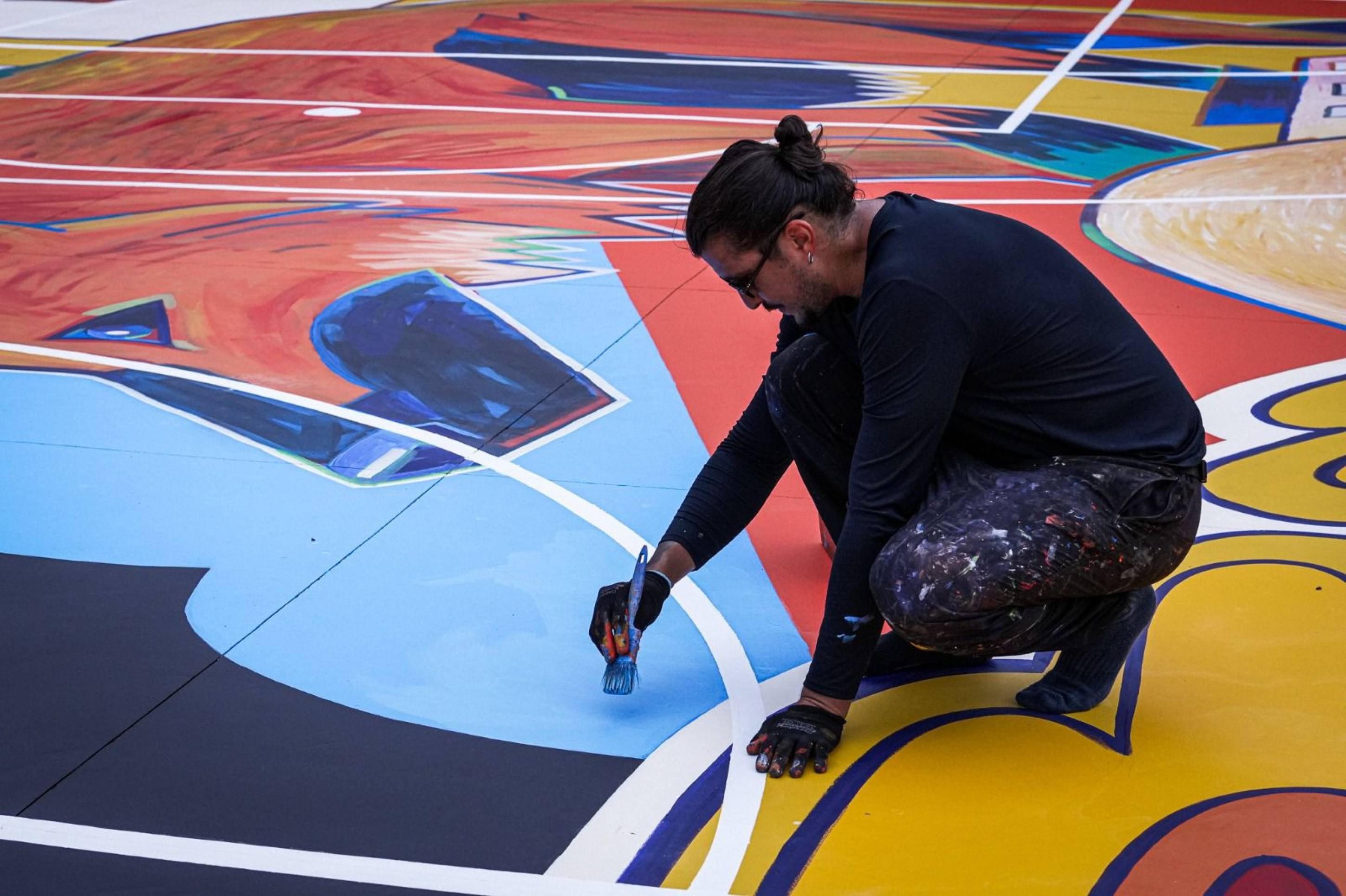 M&atilde;o buscou representar &iacute;cones da regi&atilde;o, como o lobo guar&aacute;