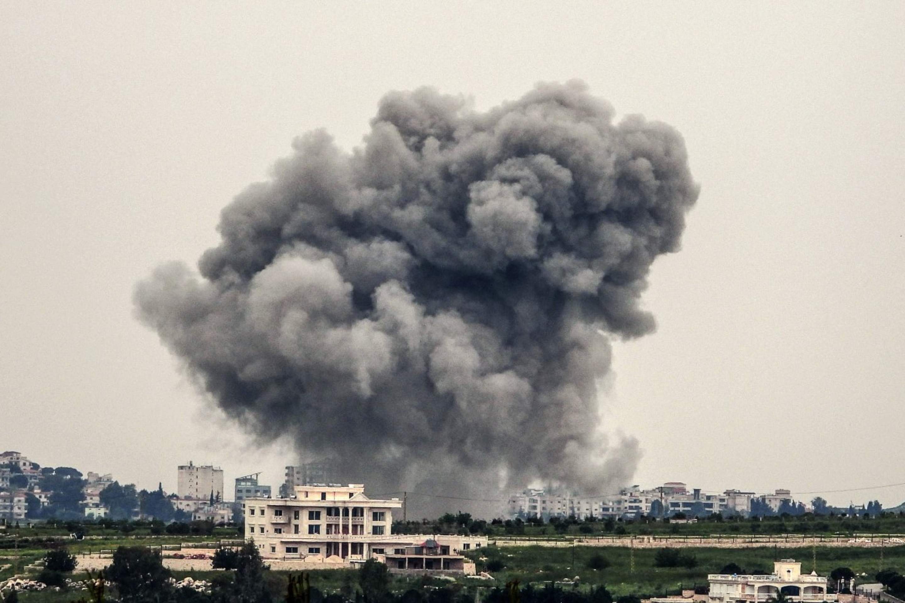  Smoke rises from targeted areas in the town of Chouk&icirc;ne, in Lebanon Nabatieh province following an airstrike, on April 26, 2026. Lebanon was drawn into the Middle East war on March 2 when Tehran-backed militant group Hezbollah launched attacks on Israel to avenge the killing of the Iranian leader. Israel has responded with broad strikes across Lebanon and a ground offensive. (Photo by AFP)       