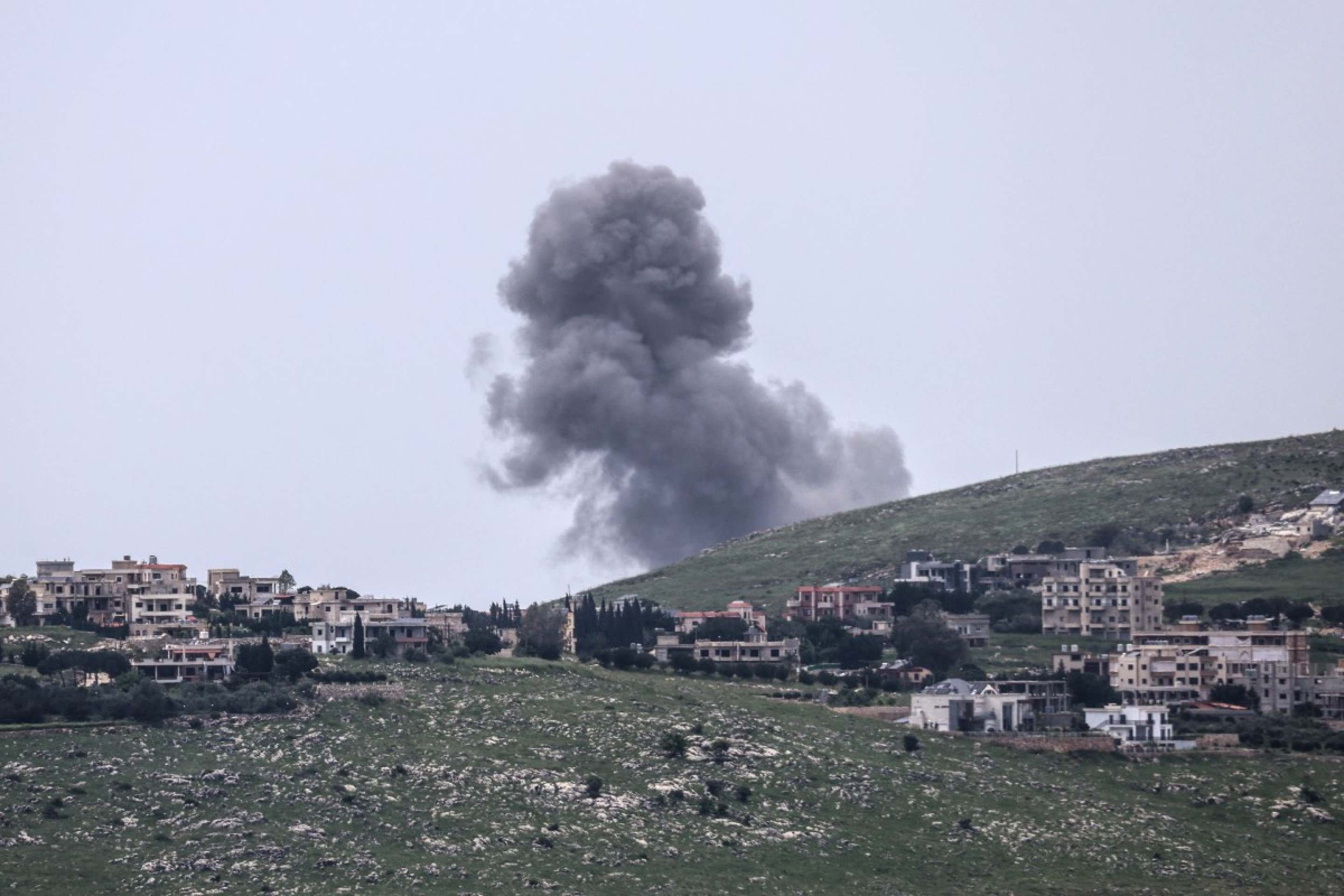  Smoke rises following an airstrike from targeted areas in Kfar Tibnit, in southern Lebanons Nabatieh province on April 26, 2026. Lebanon was drawn into the Middle East war on March 2 when Tehran-backed militant group Hezbollah launched attacks on Israel to avenge the killing of the Iranian leader. Israel has responded with broad strikes across Lebanon and a ground offensive. (Photo by AFP)       