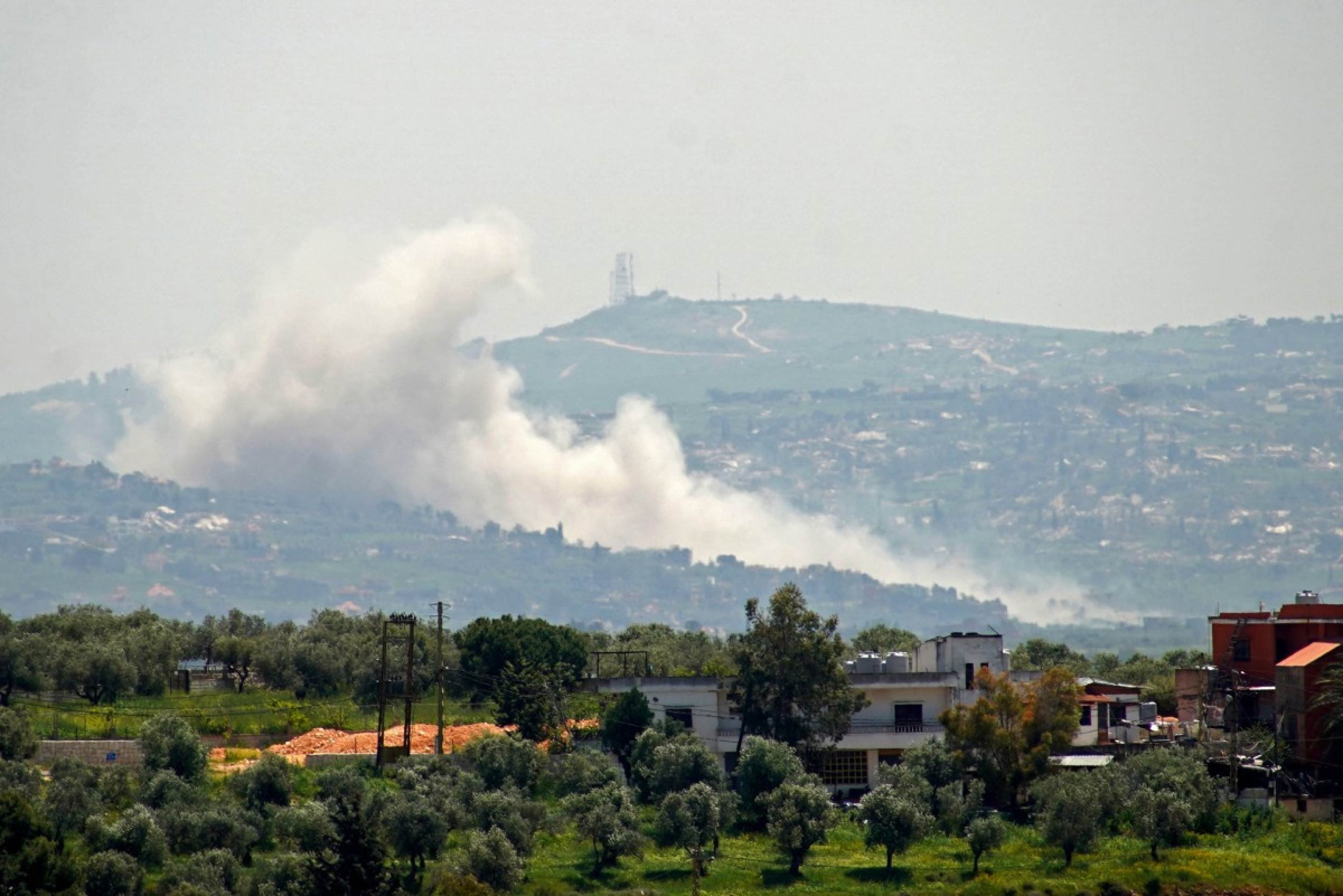  Smoke rises from explosions during Israeli military activity amid a fragile ceasefire in the southern Lebanese town of Taybeh on April 27, 2026. (Photo by Abbas Fakih / AFP)       