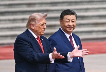  Donald Trump é recebido por Xi Jinping na entrada do Grande Salão do Povo, na Praça da Paz Celestial -  (crédito: Brendan SMIALOWSKI/AFP) - Donald Trump é recebido por Xi Jinping na entrada do Grande Salão do Povo, na Praça da Paz Celestial -  (crédito: Brendan SMIALOWSKI/AFP)