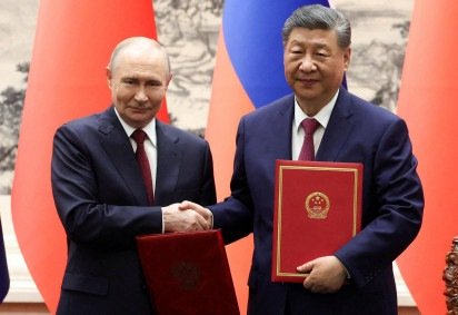 O que Vladimir Putin e Xi Jinping discutiram na visita do presidente russo a Pequim uma semana após viagem de Trump à China -  (crédito: BBC Geral)
