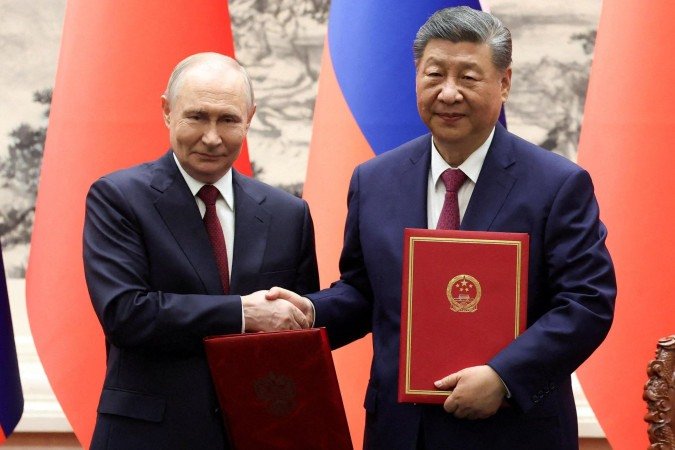 O que Vladimir Putin e Xi Jinping discutiram na visita do presidente russo a Pequim uma semana após viagem de Trump à China - (crédito: BBC Geral) O que Vladimir Putin e Xi Jinping discutiram na visita do presidente russo a Pequim uma semana após viagem de Trump à China - (crédito: BBC Geral)