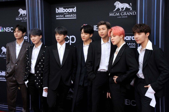 Os integrantes do BTS conquistaram fãs ao redor do mundo com música, dança e carisma (Imagem: Tinseltown | Shutterstock) - (crédito: EdiCase) Os integrantes do BTS conquistaram fãs ao redor do mundo com música, dança e carisma (Imagem: Tinseltown | Shutterstock) - (crédito: EdiCase)