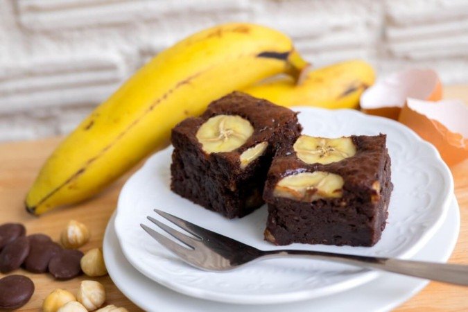 Brownie proteico com banana e nozes (Imagem: Nitcha | Shutterstock)
- (crédito: EdiCase) Brownie proteico com banana e nozes (Imagem: Nitcha | Shutterstock)
- (crédito: EdiCase)