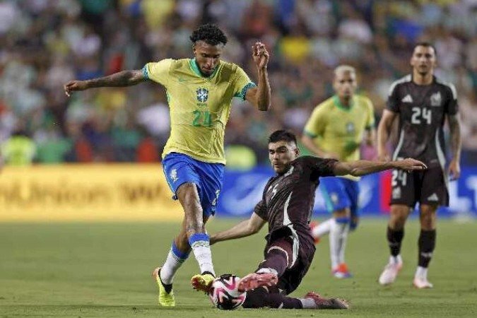 O volante Éderson em ação no amistoso contra o México antes da Copa América de 2024: escolhido por Carlo Ancelotti para o lugar de Wesley - (crédito: Rafael Ribeiro/CBF) O volante Éderson em ação no amistoso contra o México antes da Copa América de 2024: escolhido por Carlo Ancelotti para o lugar de Wesley - (crédito: Rafael Ribeiro/CBF)