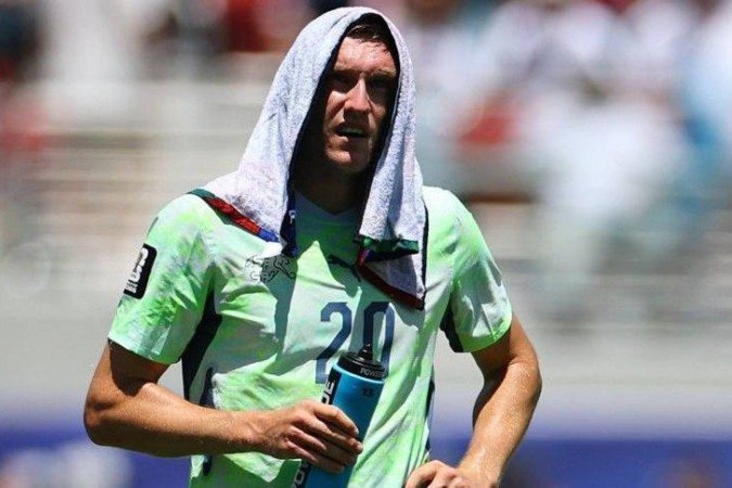 O Brasil empatou contra o Marrocos logo depois de o técnico Carlo Ancelotti reunir seus jogadores durante uma pausa para hidratação para discutir questões táticas - (crédito: Getty Images) O Brasil empatou contra o Marrocos logo depois de o técnico Carlo Ancelotti reunir seus jogadores durante uma pausa para hidratação para discutir questões táticas - (crédito: Getty Images)