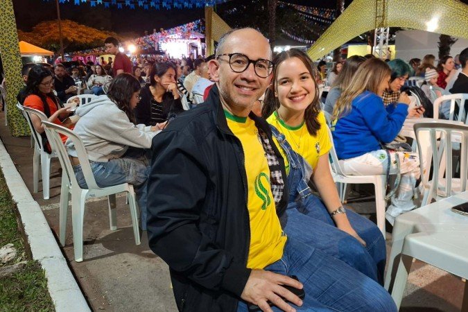 Pai e filha durante festa em paróquia de Águas Claras - (crédito: Francisco Artur de Lima/ C.B/D.A Press) Pai e filha durante festa em paróquia de Águas Claras - (crédito: Francisco Artur de Lima/ C.B/D.A Press)