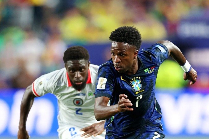 Vinicius Junior #7 of Brazil controls the ball under pressure from Carlens Arcus #2 of Haiti during the FIFA World Cup 2026 Group C match between Brazil and Haiti at Philadelphia Stadium on June 19, 2026 in Philadelphia, Pennsylvania. 