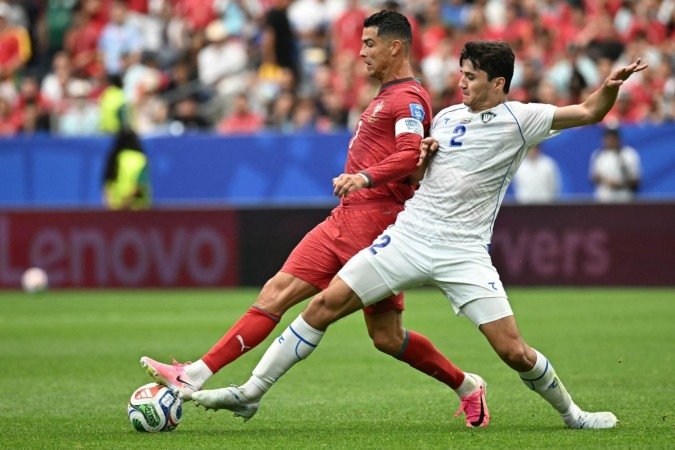 Cristiano Ronaldo e Messi marcam duas vezes cada e lideram Seleção da Rodada dos Estagiários do CB - (crédito: Paul ELLIS/AFP) Cristiano Ronaldo e Messi marcam duas vezes cada e lideram Seleção da Rodada dos Estagiários do CB - (crédito: Paul ELLIS/AFP)