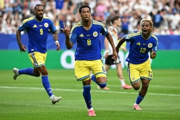  Curacao's players celebrate after scoring agoal during the 2026 World Cup Group E football match between Germany and Curacao at the Houston Stadium in Houston on June 14, 2026.   -  (crédito:  Paul ELLIS / AFP)