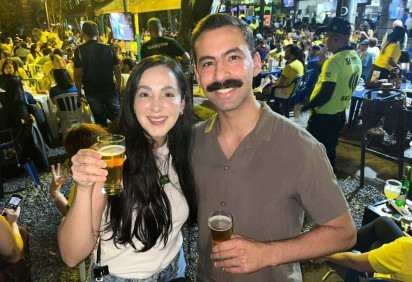 João Arruda e a namorada Ana Carolina acompanham Brasil x Escócia no Libanus -  (crédito: Vitória Torres/CB/D.A Press) -João Arruda e a namorada Ana Carolina acompanham Brasil x Escócia no Libanus -  (crédito: Vitória Torres/CB/D.A Press)