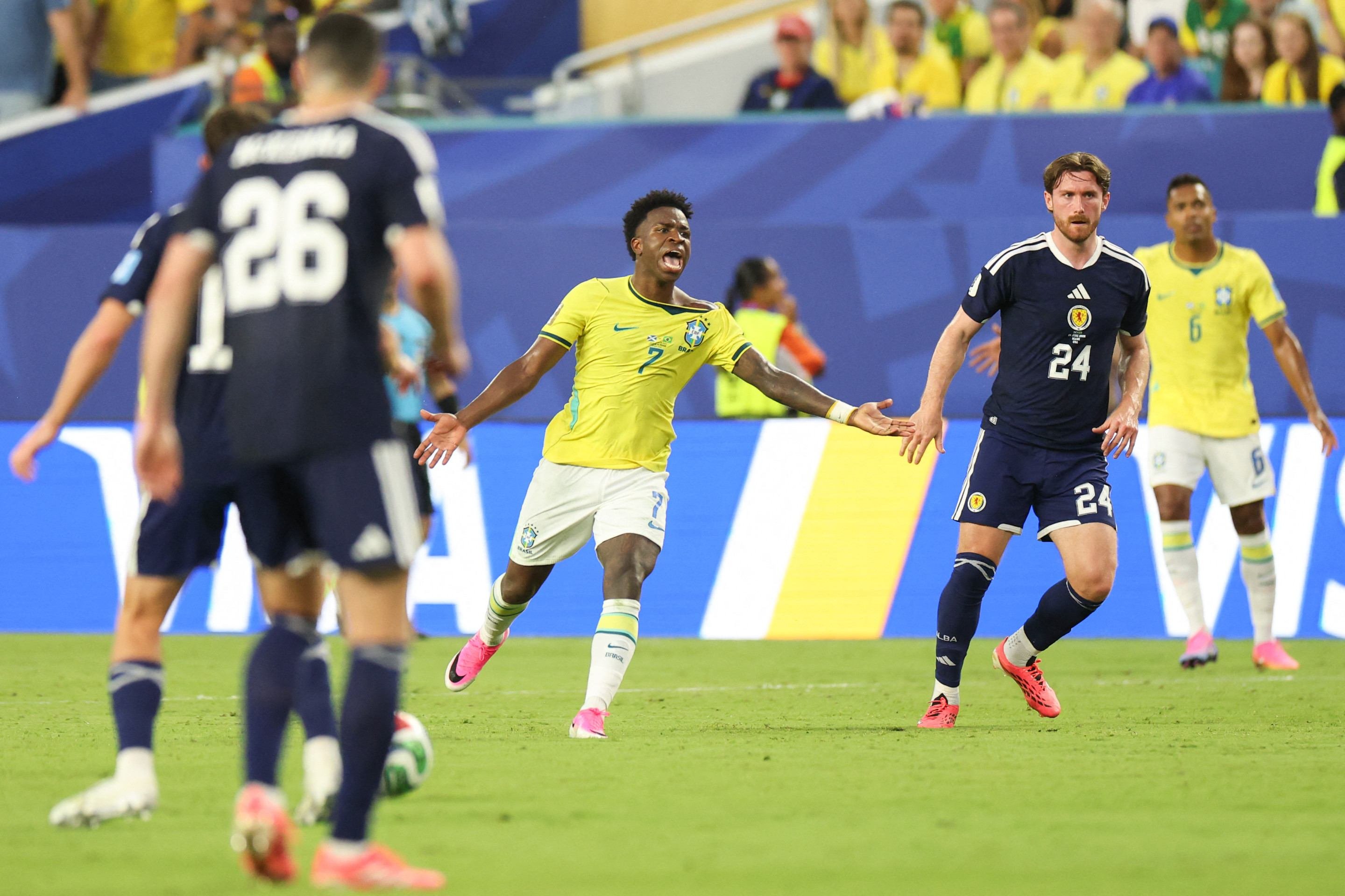  Brazils forward #07 Vinicius Junior reacts during the 2026 World Cup Group C football match between Scotland and Brazil at the Miami Stadium in Miami Gardens on June 24, 2026.  (Photo by PATRICIA DE MELO MOREIRA / AFP)       