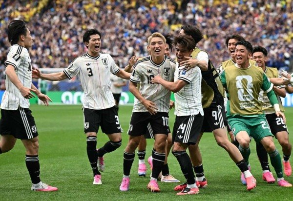 Japão abre o placar contra o Brasil -  (crédito: Paul ELLIS / AFP)