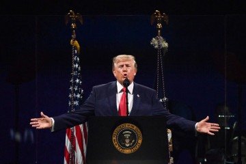 Donald Trump comemora decisão da Fifa em anular suspensão de Balogun para jogo contra a Bélgica - (crédito: Alex WROBLEWSKI / AFP) ) Donald Trump comemora decisão da Fifa em anular suspensão de Balogun para jogo contra a Bélgica - (crédito: Alex WROBLEWSKI / AFP) )