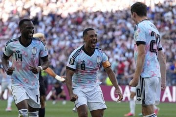 O técnico da Bélgica, Rudi Garcia, conversou com Folarin Balogun após a partida - (crédito: AFP via Getty Images) O técnico da Bélgica, Rudi Garcia, conversou com Folarin Balogun após a partida - (crédito: AFP via Getty Images)