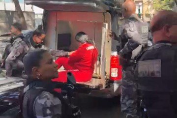 Diarista chega a apartamento em BH para reconstituição de crime - Reprodução