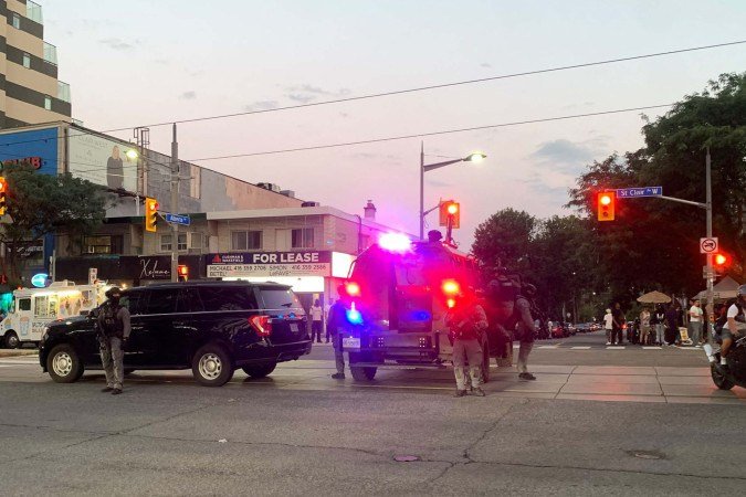 Emergency Task Force vehicles and police officers are seen on the site of a shooting in Toronto, Canada on July 11, 2026. Police in Toronto were searching Saturday night, July 11, for an active shooter who had killed two people and wounded three in an area lined with shops and restaurants. Emergency Task Force vehicles and police officers are seen on the site of a shooting in Toronto, Canada on July 11, 2026. Police in Toronto were searching Saturday night, July 11, for an active shooter who had killed two people and wounded three in an area lined with shops and restaurants.
