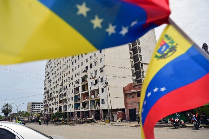 Embora alguns indicadores econômicos tenham melhorado nos últimos anos, quase 70% dos lares venezuelanos vivem na pobreza - (crédito: AFP) Embora alguns indicadores econômicos tenham melhorado nos últimos anos, quase 70% dos lares venezuelanos vivem na pobreza - (crédito: AFP)