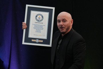 Recentemente, o rapper Pitbull entrou para o Guinness após reunir multidão de 'carecas' em show - (crédito: AFP) Recentemente, o rapper Pitbull entrou para o Guinness após reunir multidão de 'carecas' em show - (crédito: AFP)