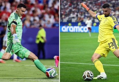 Esta combinação de fotos de arquivo mostra o goleiro da Argentina, Emiliano Martínez; e o goleiro da Espanha, Unai Simón       -  (crédito: CHARLY TRIBALLEAU / AFP)