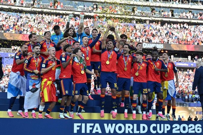 Spain's players celebrates with the trophy after beating Argentina in the 2026 World Cup football tournament final match between Spain and Argentina at the New York/New Jersey Stadium in East Rutherford on July 19, 2026.