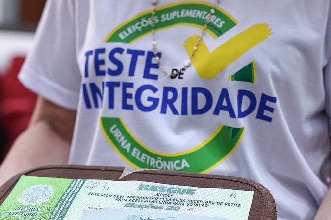 A urna eletrônica e seu selo de segurança são parte essencial do Teste de Integridade, garantindo a imparcialidade nas Eleições 2026. - (crédito: Antonio Augusto/TSE) A urna eletrônica e seu selo de segurança são parte essencial do Teste de Integridade, garantindo a imparcialidade nas Eleições 2026. - (crédito: Antonio Augusto/TSE)