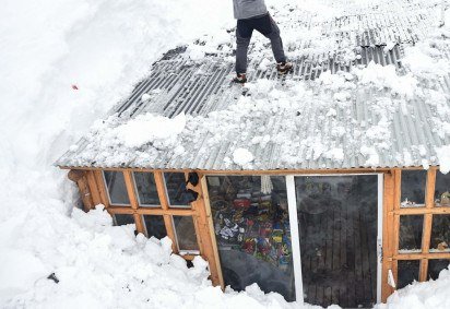 Tempestade de neve entre Argentina e Chile -  (crédito: Andres LARROVERE / AFP) -Tempestade de neve entre Argentina e Chile -  (crédito: Andres LARROVERE / AFP)