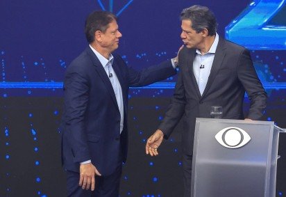 Tarcísio e Haddad participam do primeiro debate eleitoral para o governo de São Paulo     -  (crédito: Miguel Schincariol/AFP)
