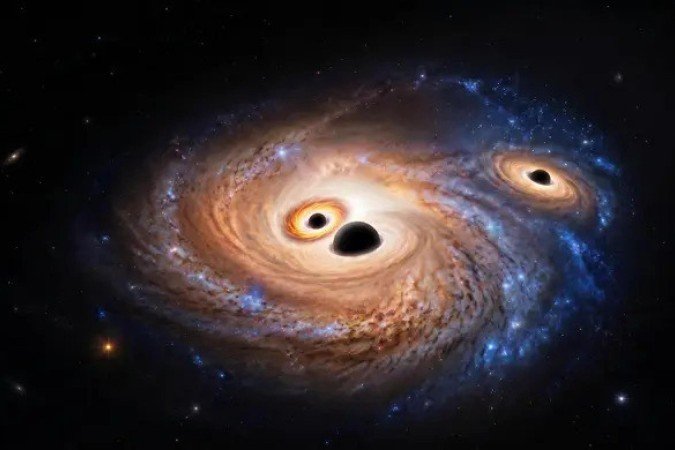 Uma visualização gerada por IA da galáxia distante, contendo os três buracos negros massivos e ativos - (crédito: Max Planck Institute for Extraterrestrial Physics) Uma visualização gerada por IA da galáxia distante, contendo os três buracos negros massivos e ativos - (crédito: Max Planck Institute for Extraterrestrial Physics)