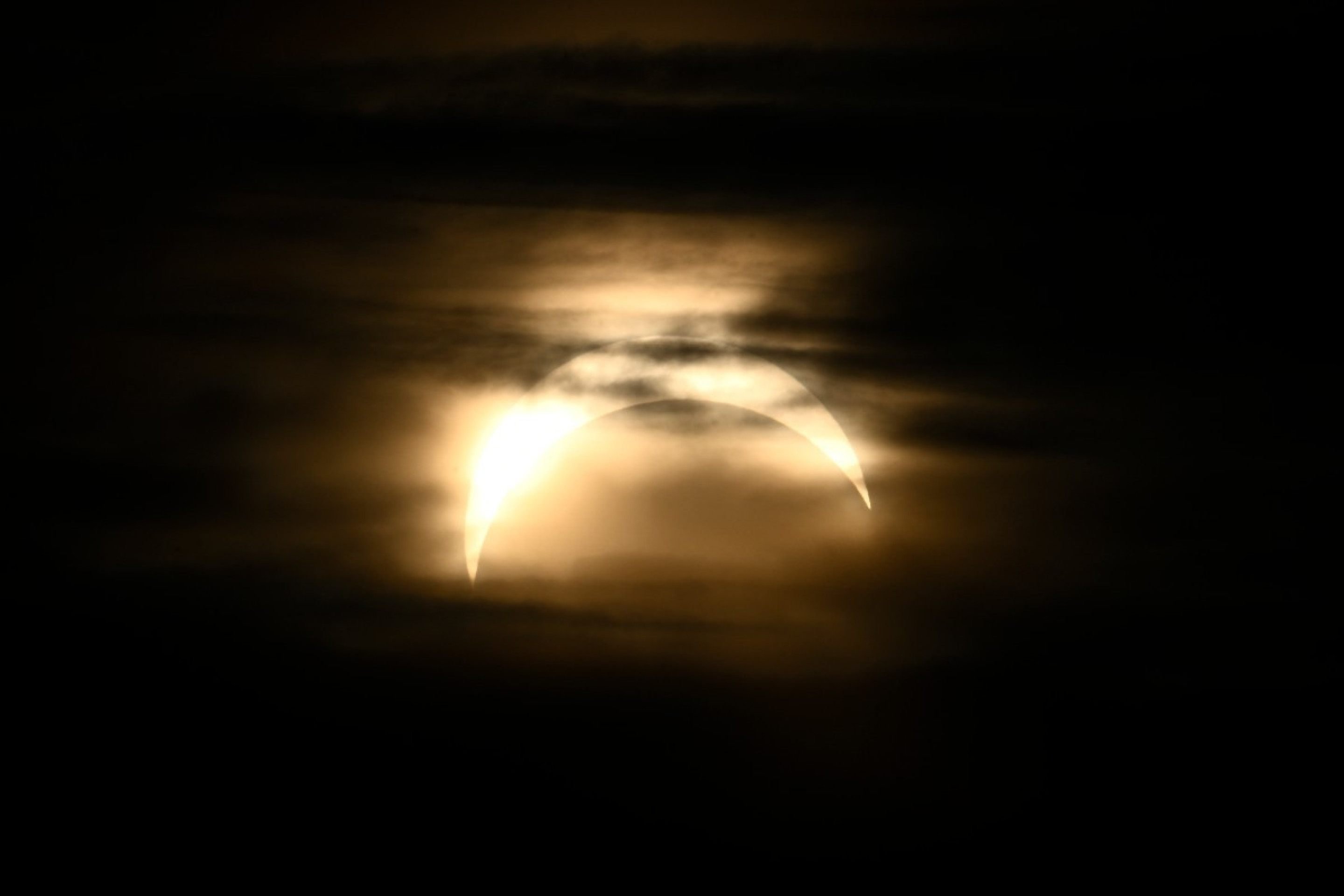 O eclipse parcial &eacute; visto do parque Observatorielunden, no centro de Estocolmo, Su&eacute;cia, em 12 de agosto de 2026      