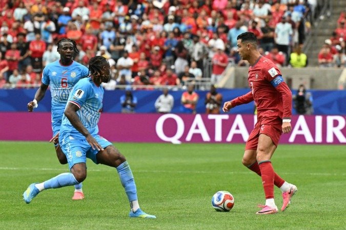 Portugal's forward #07 Cristiano Ronaldo (R) controls the ball during the 2026 World Cup Group K football match between Portugal and the Democratic Republic of Congo at the Houston Stadium in Houston on June 17, 2026. (Photo by RONALDO SCHEMIDT / AFP)
- (crédito: AFP) Portugal's forward #07 Cristiano Ronaldo (R) controls the ball during the 2026 World Cup Group K football match between Portugal and the Democratic Republic of Congo at the Houston Stadium in Houston on June 17, 2026. (Photo by RONALDO SCHEMIDT / AFP)
- (crédito: AFP)