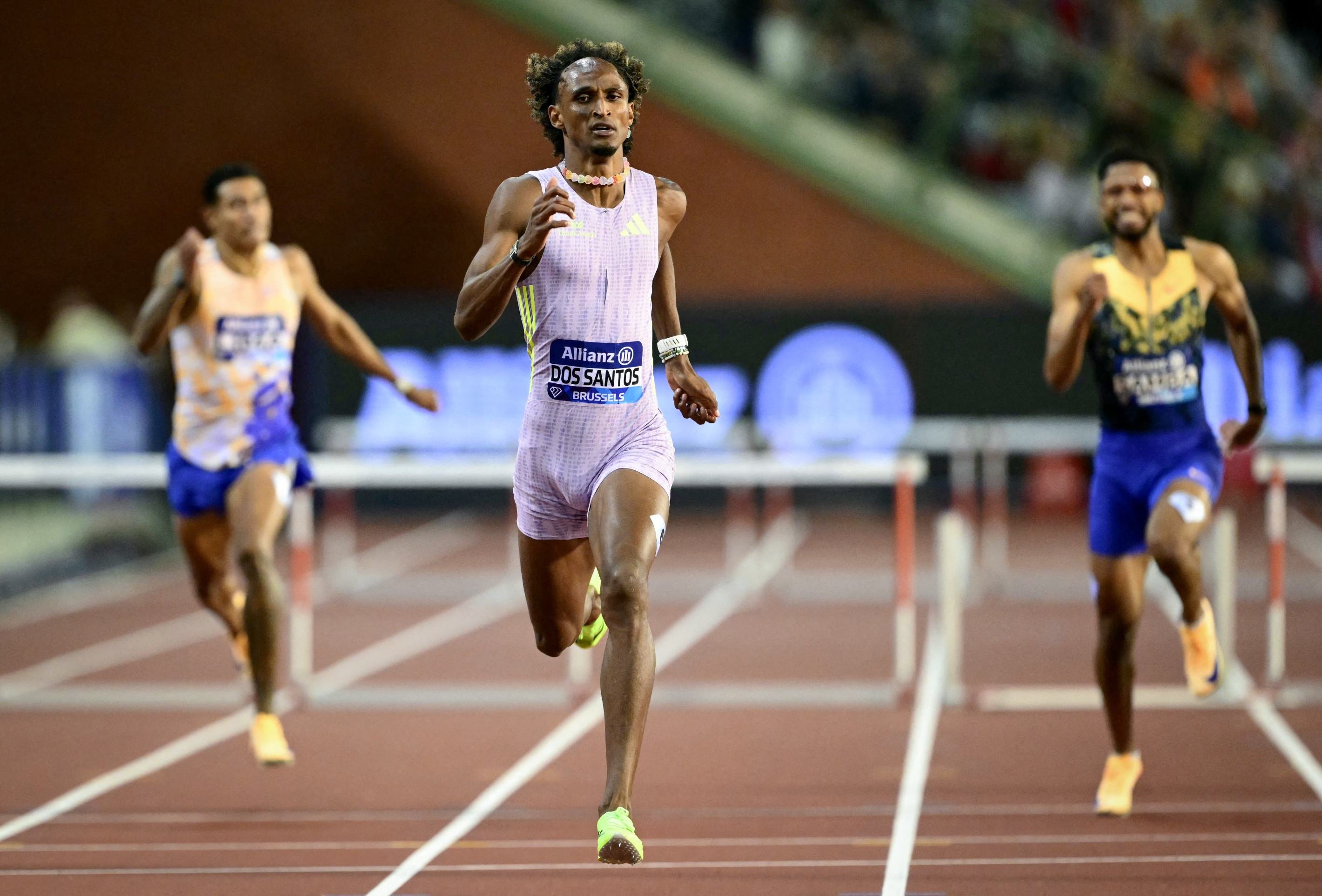 Brazil's Alison dos Santos (C) competes in the men's 400m Hurdles final during the World Athletics Diamond League athletics meeting at the King Baudouin Stadium in Brussels, on September 5, 2026.