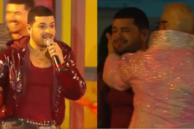 Cantor de reality da Globo comete gafe no Rock in Rio e é consolado por Belo - (crédito: Reprodução/TV Globo) Cantor de reality da Globo comete gafe no Rock in Rio e é consolado por Belo - (crédito: Reprodução/TV Globo)
