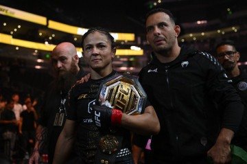 Natália Silva vence chinesa e conquista cinturão inédito para o Brasil - (crédito: AFP) Natália Silva vence chinesa e conquista cinturão inédito para o Brasil - (crédito: AFP)