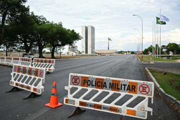 Esquema de segurança foi montado em todo o DF
- (crédito: AFP) Esquema de segurança foi montado em todo o DF
- (crédito: AFP)