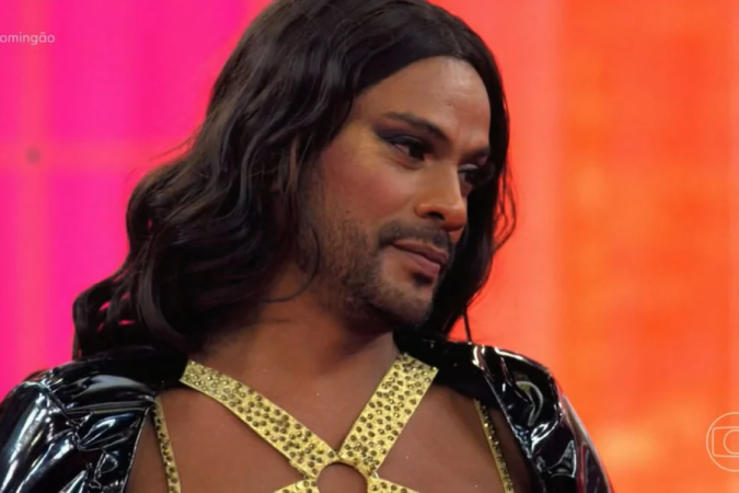 Samuel de Assis incorporou Ludmilla na Batalha do Lip Sync, do Domingão com Huck - (crédito: Reprodução/TV Globo) Samuel de Assis incorporou Ludmilla na Batalha do Lip Sync, do Domingão com Huck - (crédito: Reprodução/TV Globo)