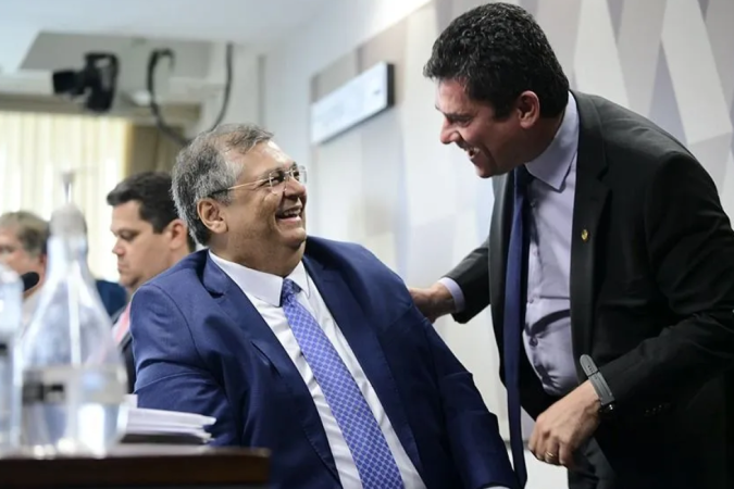 Flávio Dino e Sergio Moro durante sabatina no Senado Federal
- (crédito: Pedro França/Agência Senado) Flávio Dino e Sergio Moro durante sabatina no Senado Federal
- (crédito: Pedro França/Agência Senado)