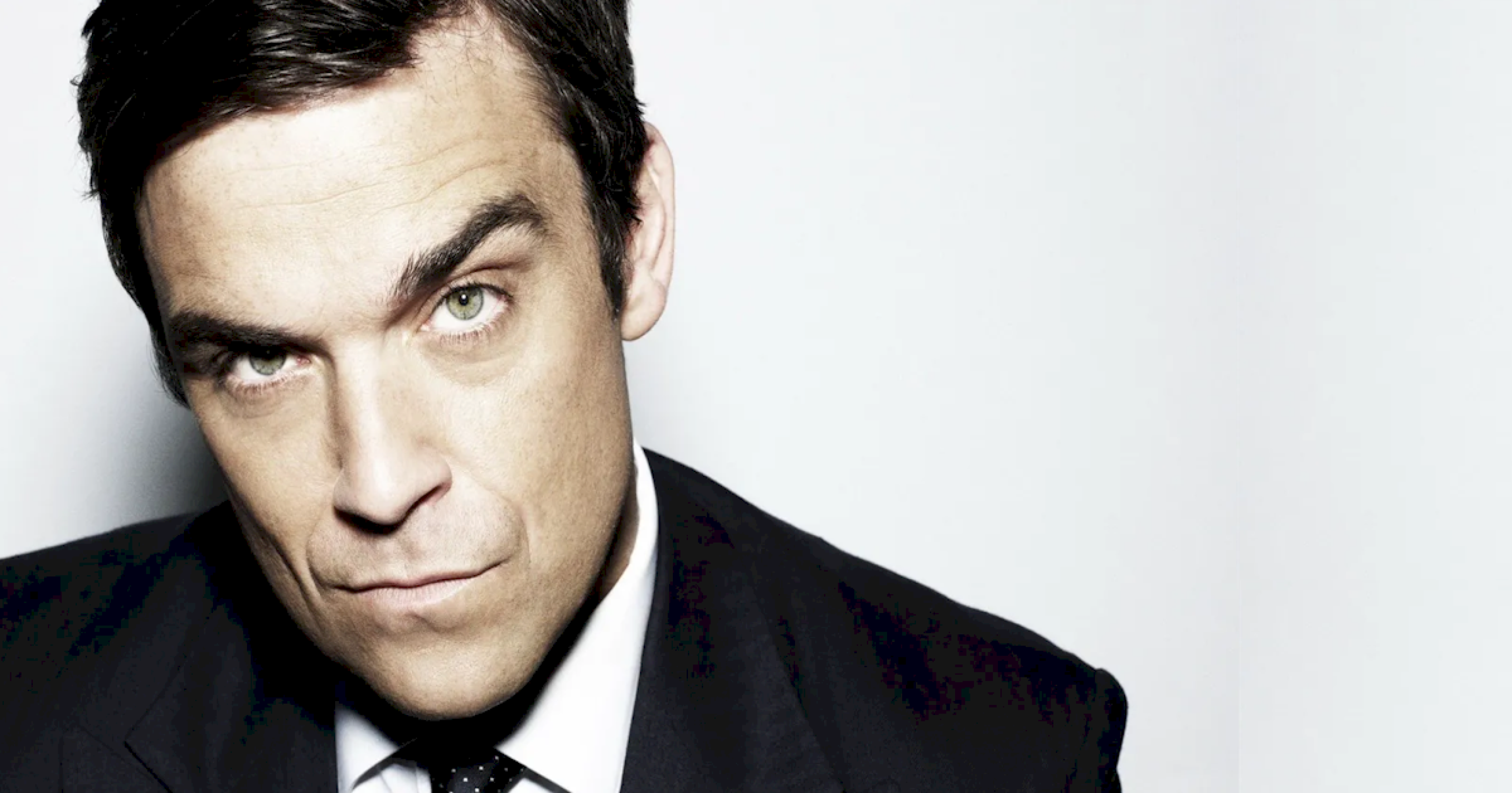 Robbie Williams iguala os Beatles em álbuns Nº 1 no Reino Unido