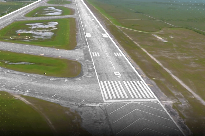 O procurador-geral da Flórida, James Uthmeier, ao lado de dois policiais uniformizados nos Everglades -  (crédito: @AGJamesUthmeier)