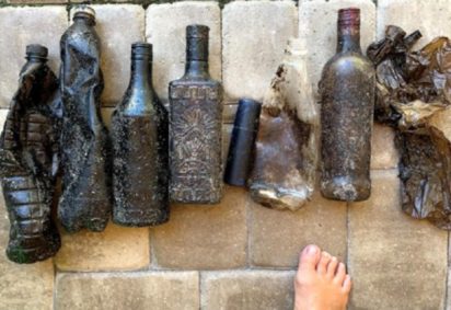 Garrafas de diferentes formatos e materiais tomadas pelo óleo: viagem intercontinental  -  (crédito: Reprodução / Agência Universidade Federal do Ceará (UFC)) -Garrafas de diferentes formatos e materiais tomadas pelo óleo: viagem intercontinental  -  (crédito: Reprodução / Agência Universidade Federal do Ceará (UFC))